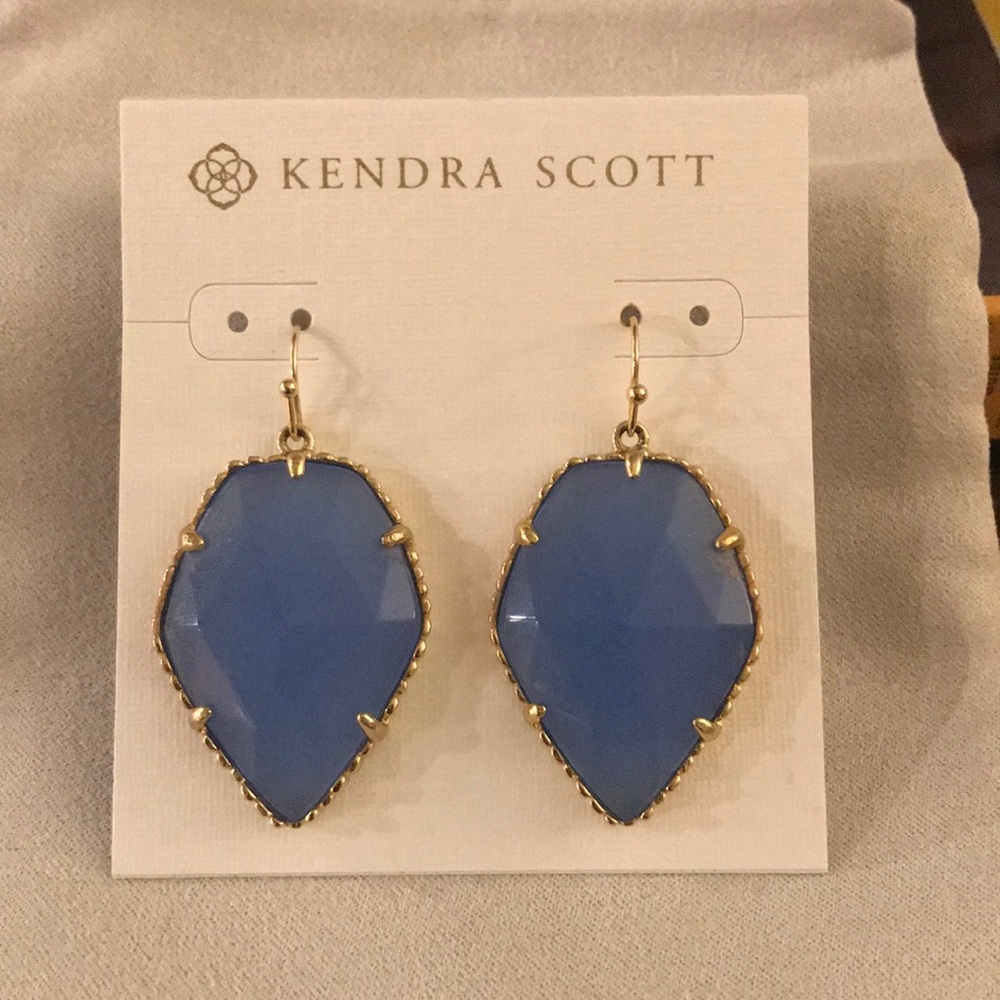Kendra Scott earrings.
